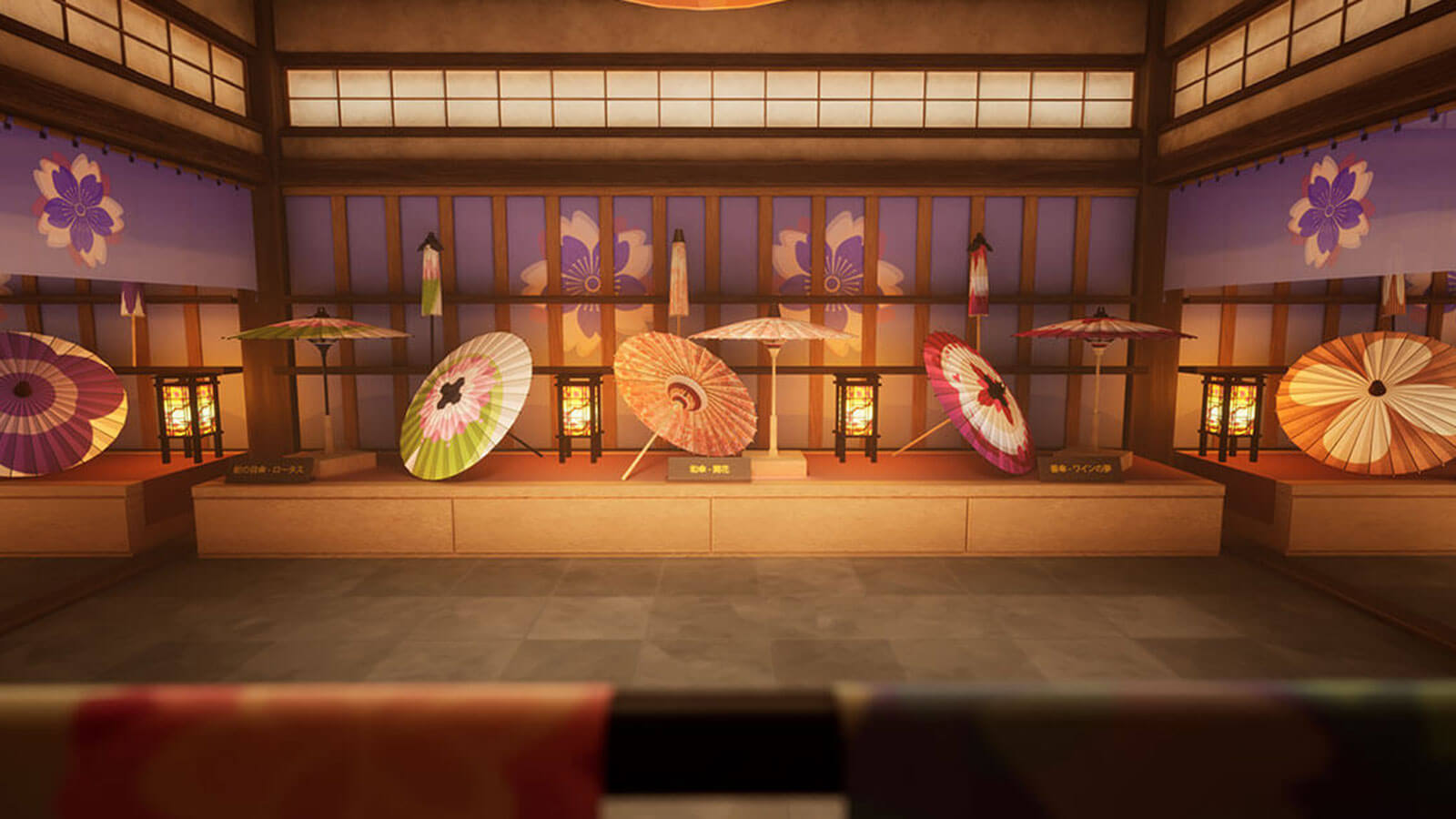 Ornate Japanese fans sit atop a small shelf as decorations