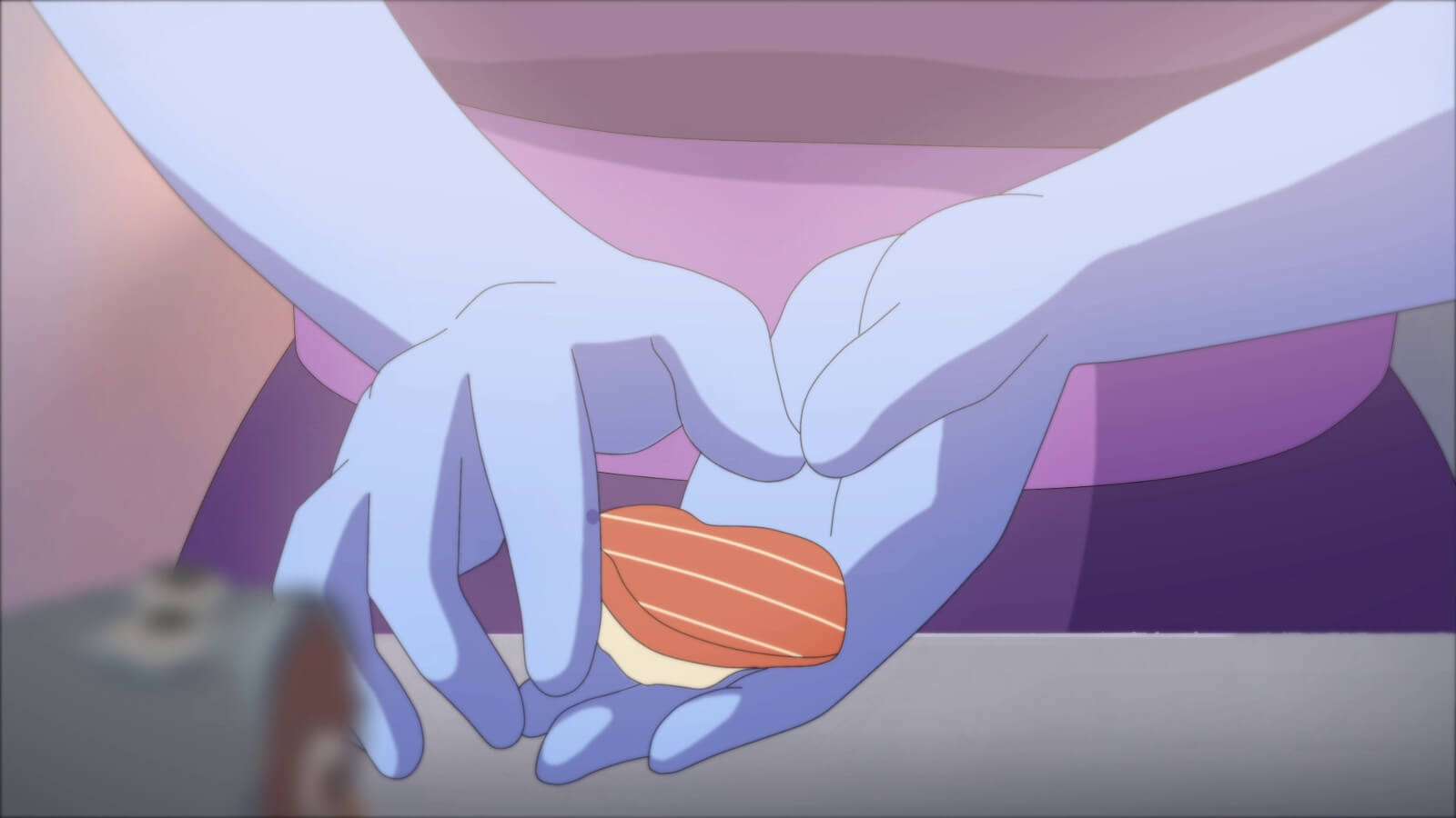 Hands holding a food item