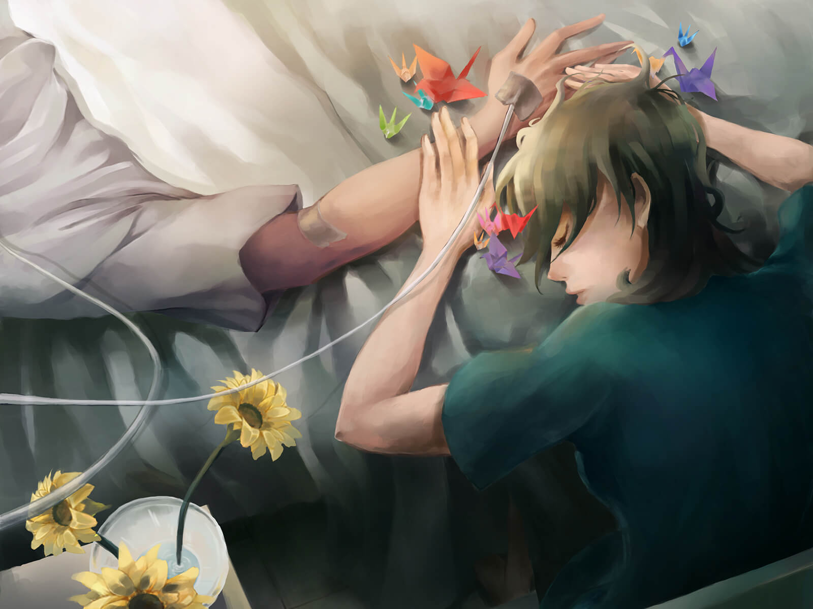 A girl rests her head against an arm of a person in a hospital bed, with several brightly colored paper cranes nearby.