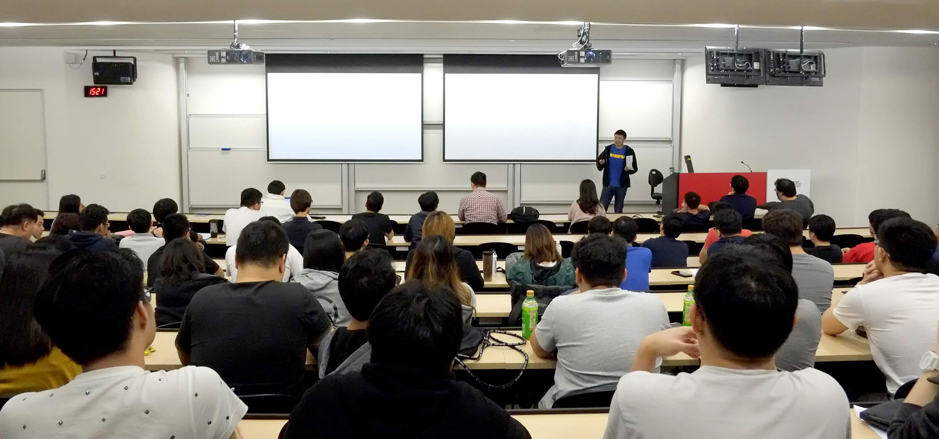 DigiPen (Singapore) BS in RTIS alumnus Tan Yao Wei speaks in front of a class