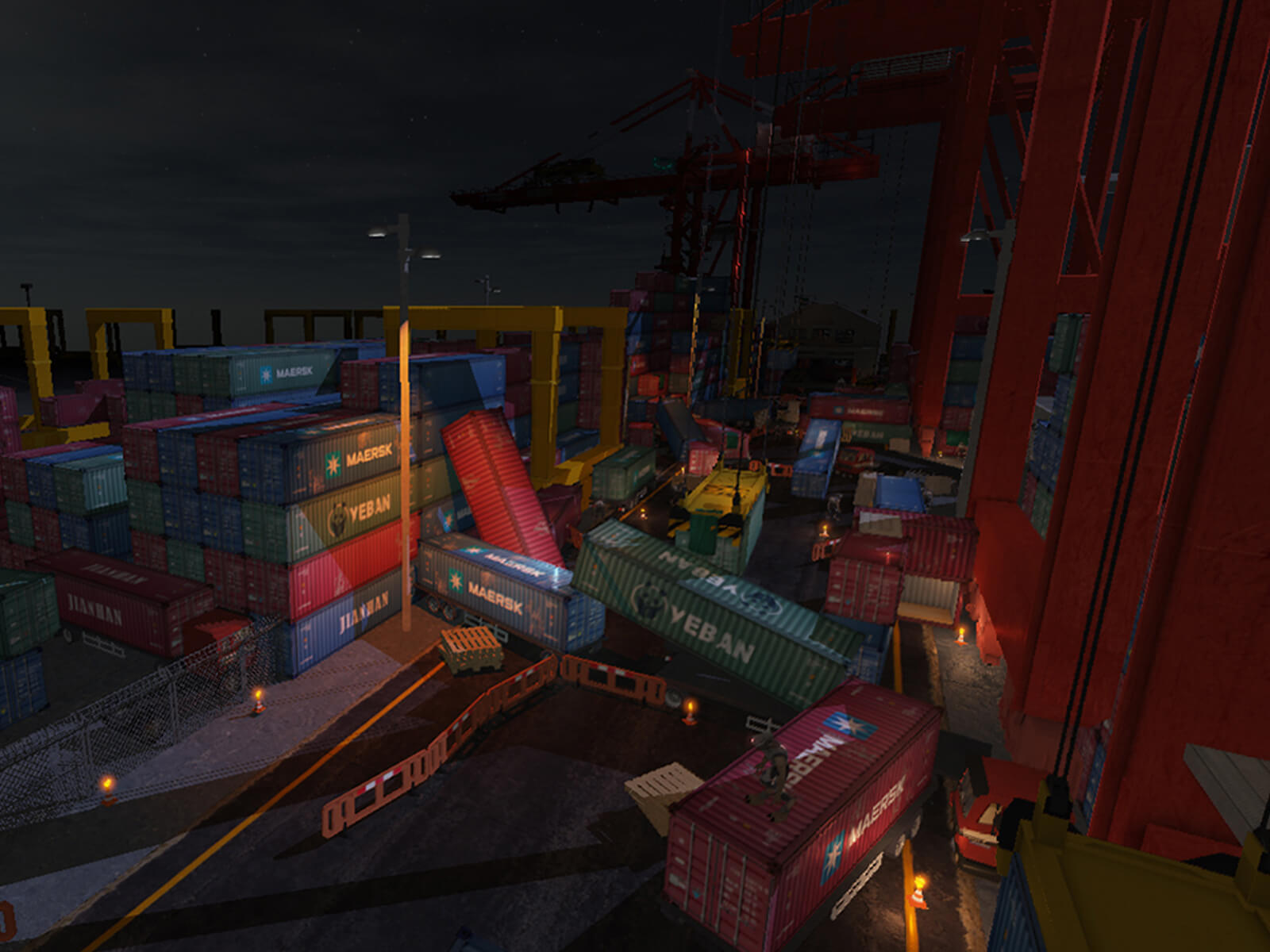 Screenshot of game at a dockyard at night with several overturned shipping containers