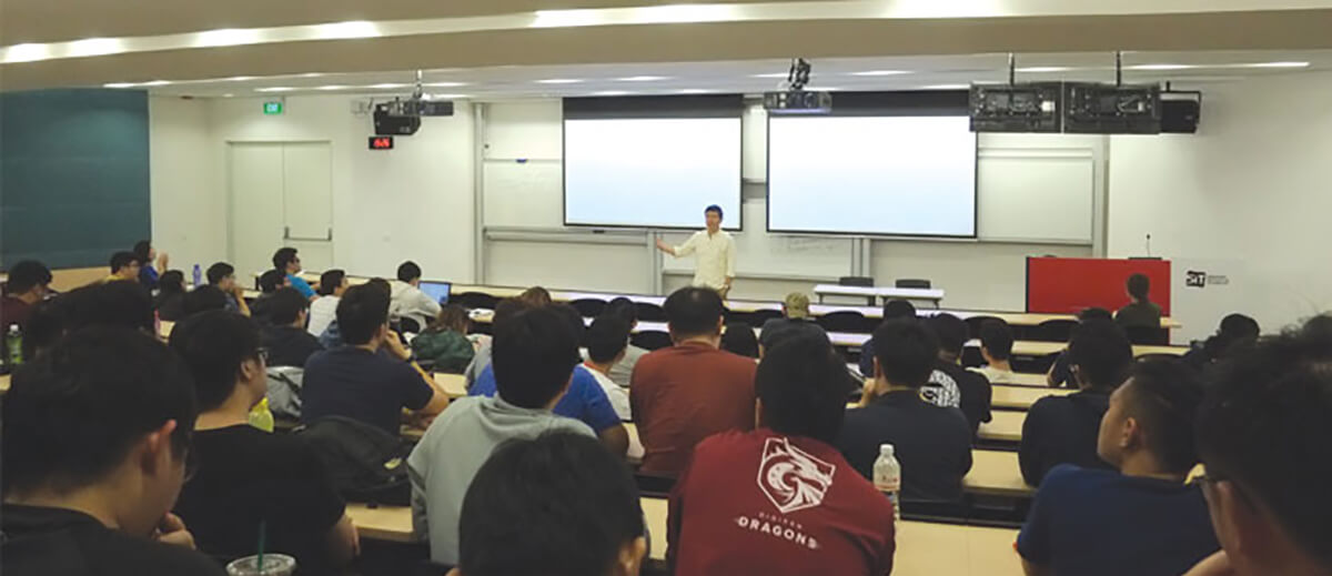 Koei Tecmo Singapore Senior Vice President Raymond Wong speaks in front of a class of DigiPen (Singapore) students