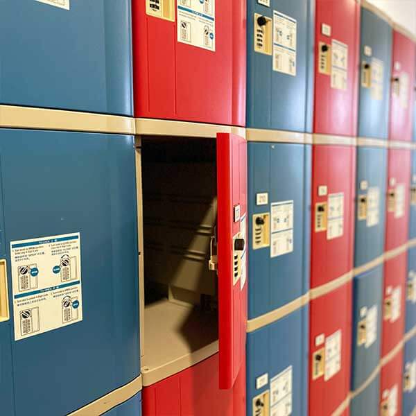 Alternate view of rows of small red and blue lockers