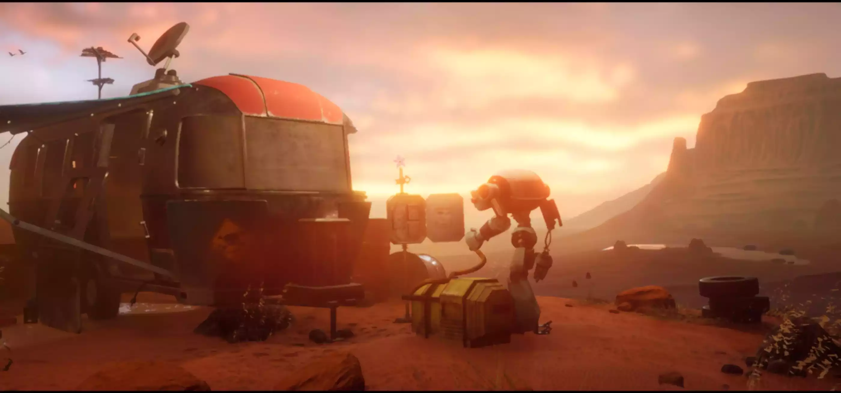 A robot does electrical work in front of a travel trailer.
