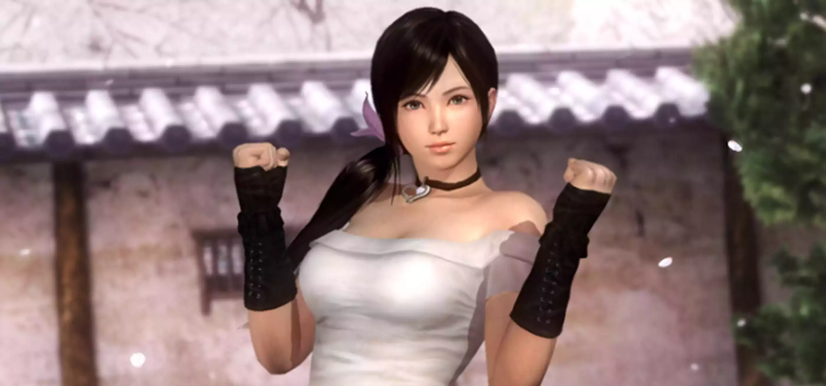 Kokoro from the Dead or Alive franchise stands in a courtyard in a white tube top