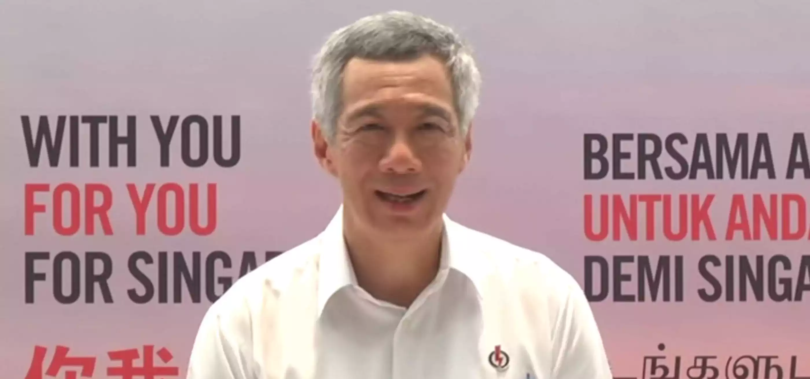 Singapore Prime Minister Lee Hsien Loong gives a speech in a white shirt